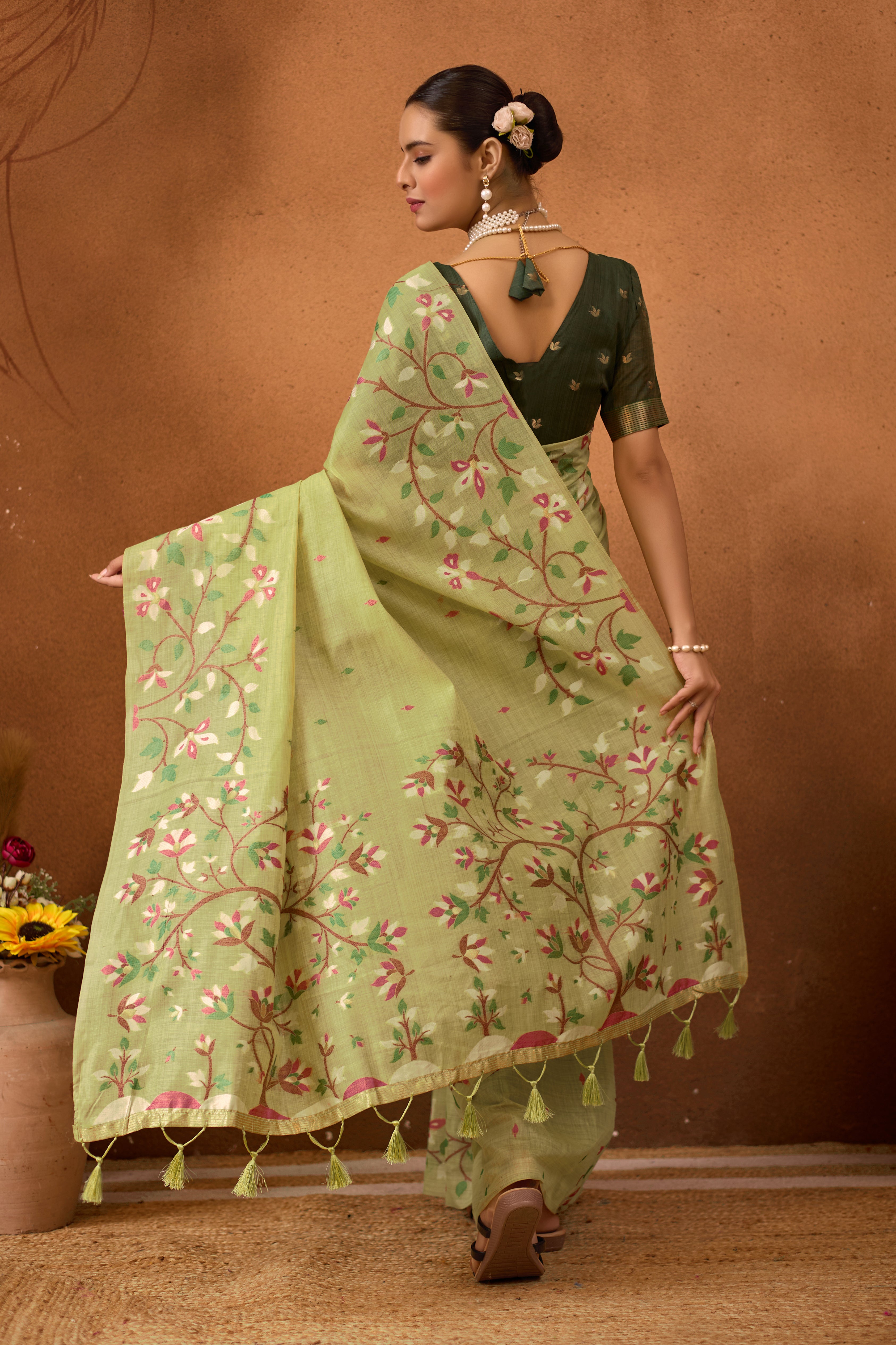 Woven Floral Design Muga Cotton Saree in Pista Green