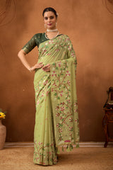 Woven Floral Design Muga Cotton Saree in Pista Green