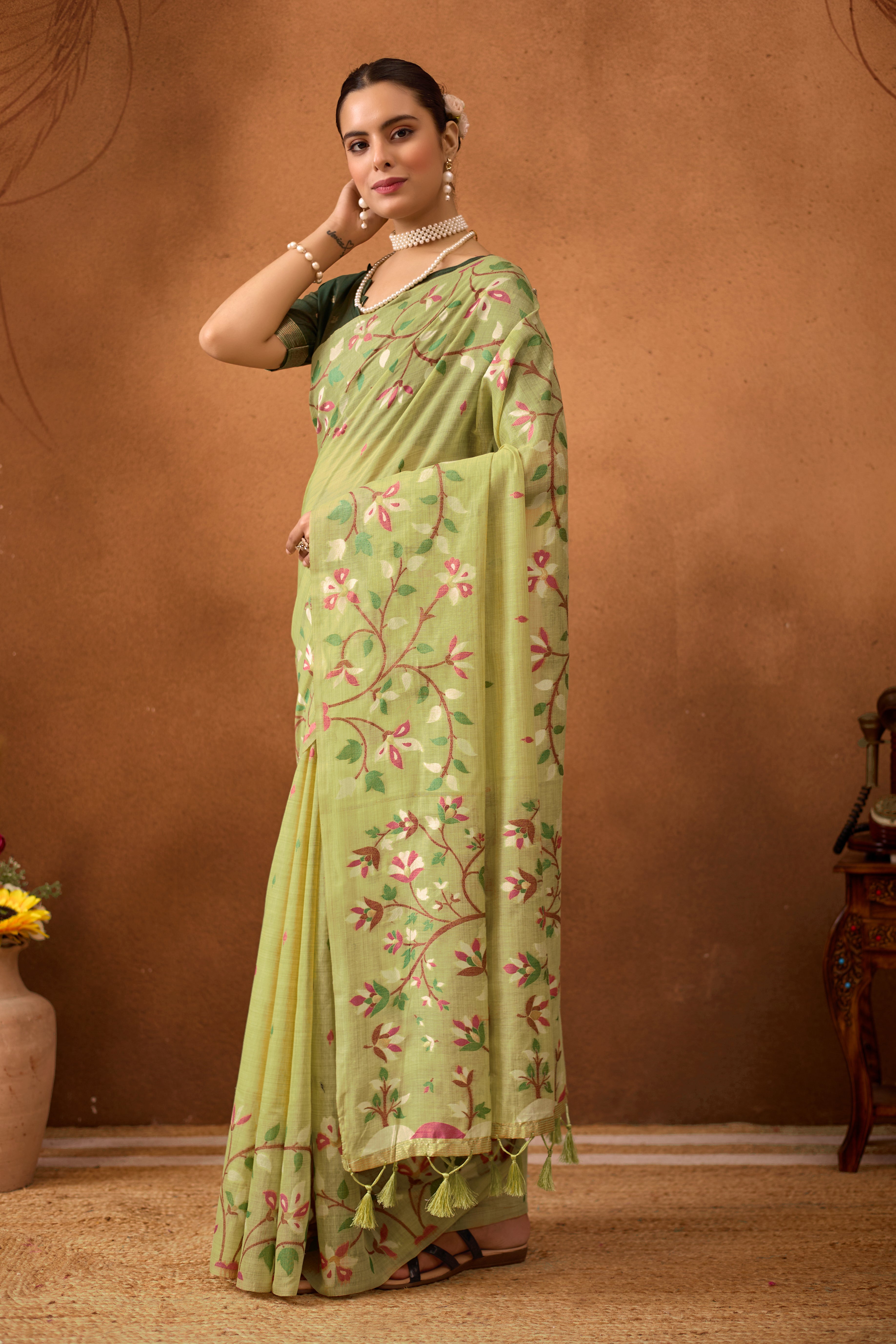 Woven Floral Design Muga Cotton Saree in Pista Green