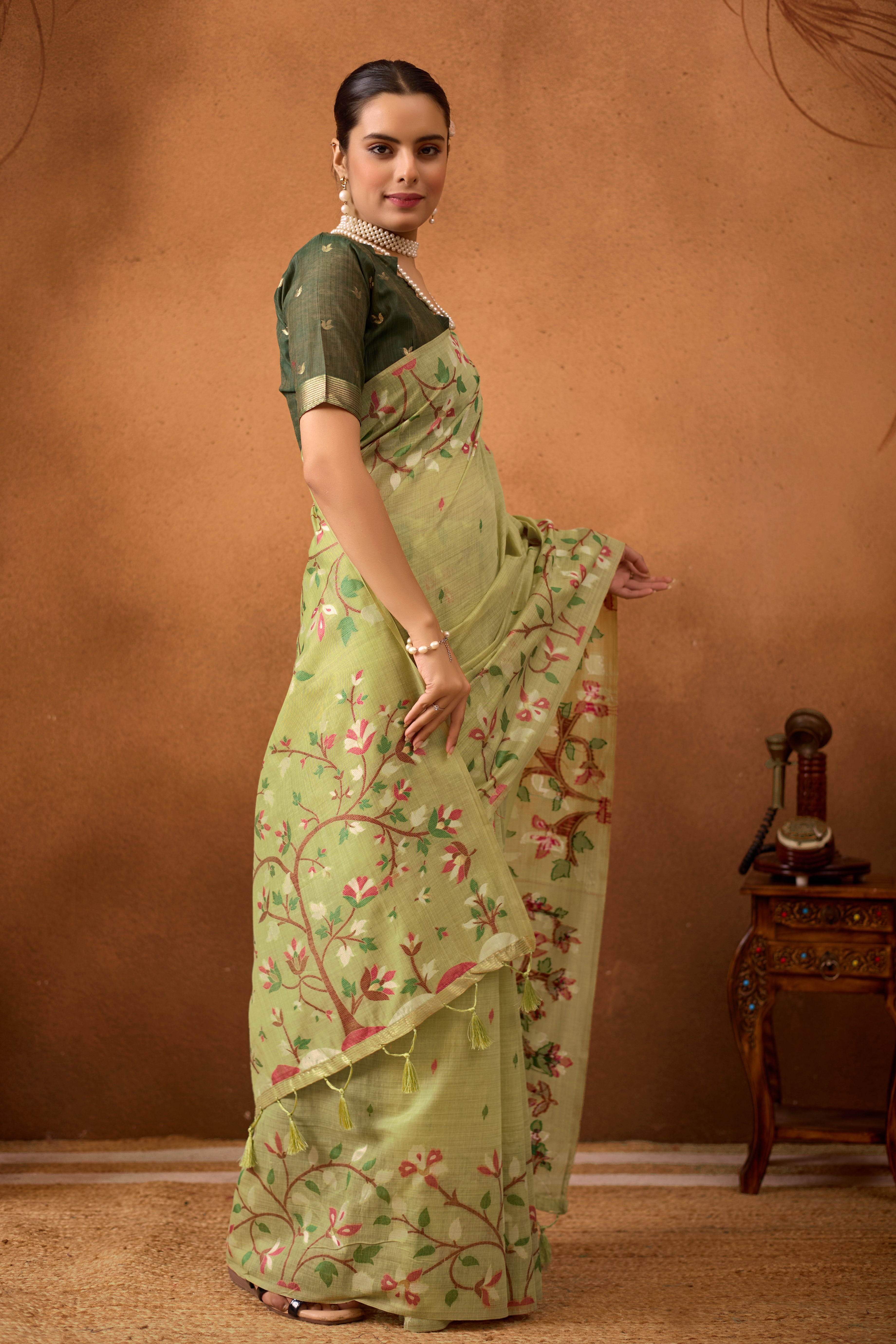 Woven Floral Design Muga Cotton Saree in Pista Green
