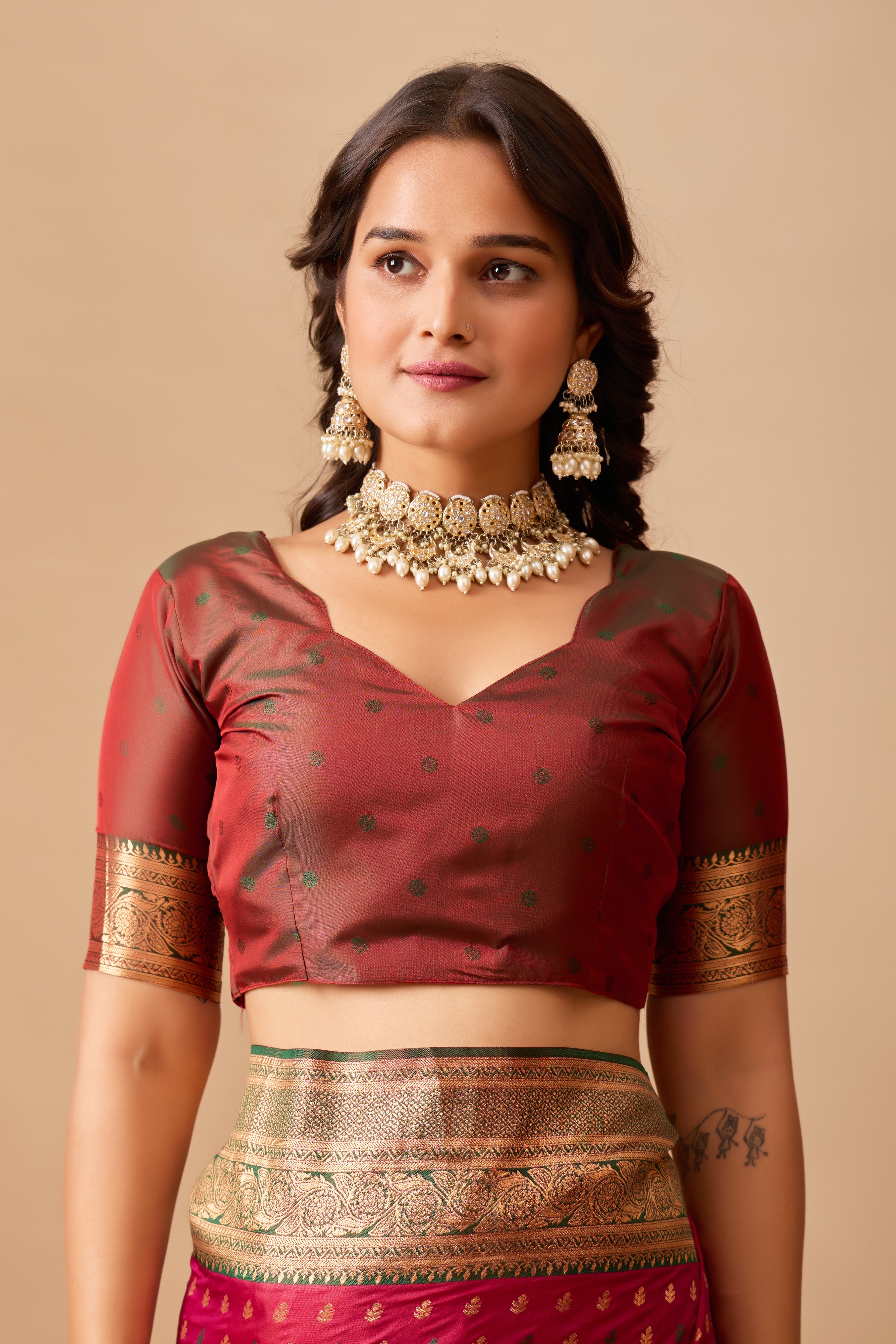 Enchanted Weaves Banarasi Silk Saree in Wine & Bottle Green Tones